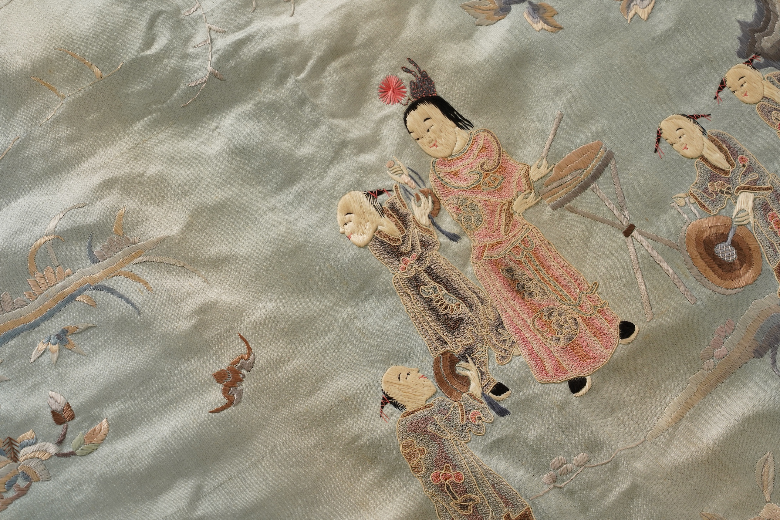 A Chinese embroidered silk ‘dragon dance’ panel, 18th/19th century